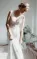 Lace Sleeveless Elegant Mermaid Plunging V-neck Bridal Gown With Deep V-back And Buttons