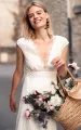 Ethereal Chiffon Lace V-neck A Line Short Sleeve Wedding Dress with Low-V Back