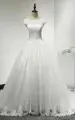 Jewel Neck Cap Sleeve Tulle Ball Gown With Scalloped Hem