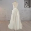 Spaghetti Straps Appliqued Lace Wedding Dress with Feathers
