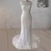 White Mermaid Cap Sleeve Lace Wedding Dress